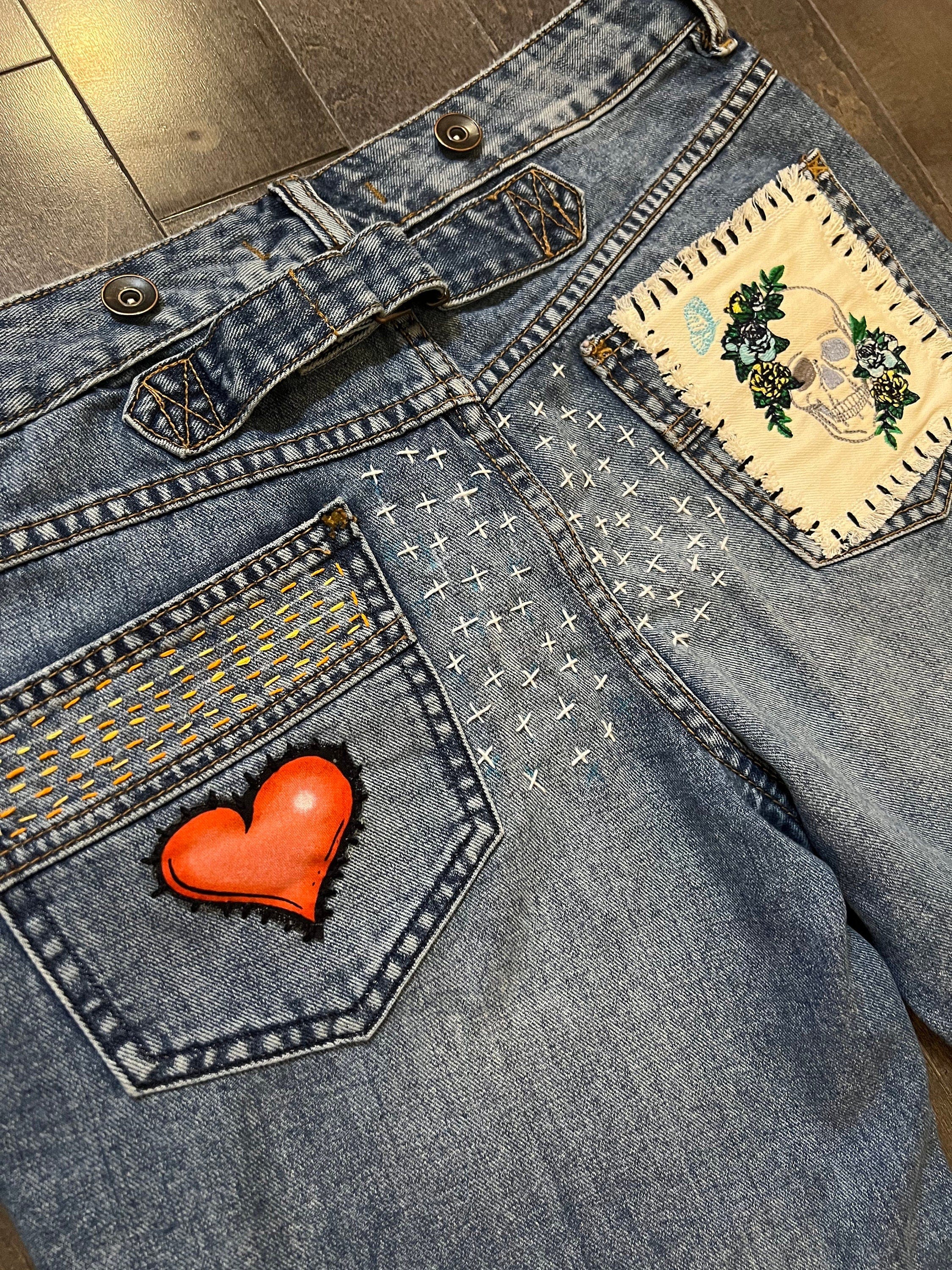 Patchwork Free People 29 carpenter JEANS embroidered Sacred Heart Day of the Dead SUGAR SKULL Dia De Los Muertos patches repurposed Pants